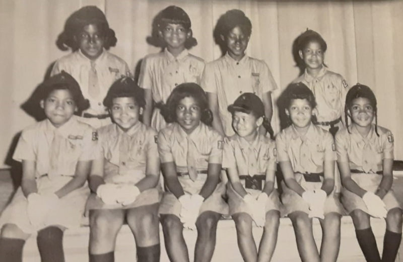 Brownie Troop early 1960s. Shown in back are (l-r) Sylvia Collick, Lisa Kemp, Bonita Johnson and Caroly Evans. In front are Venita Thomas Young, Thelma Dunning, Tammy Maull, Ondra Scott, Valarie Scott and Celeste Ball. SOURCE: VENITA THOMAS YOUNG